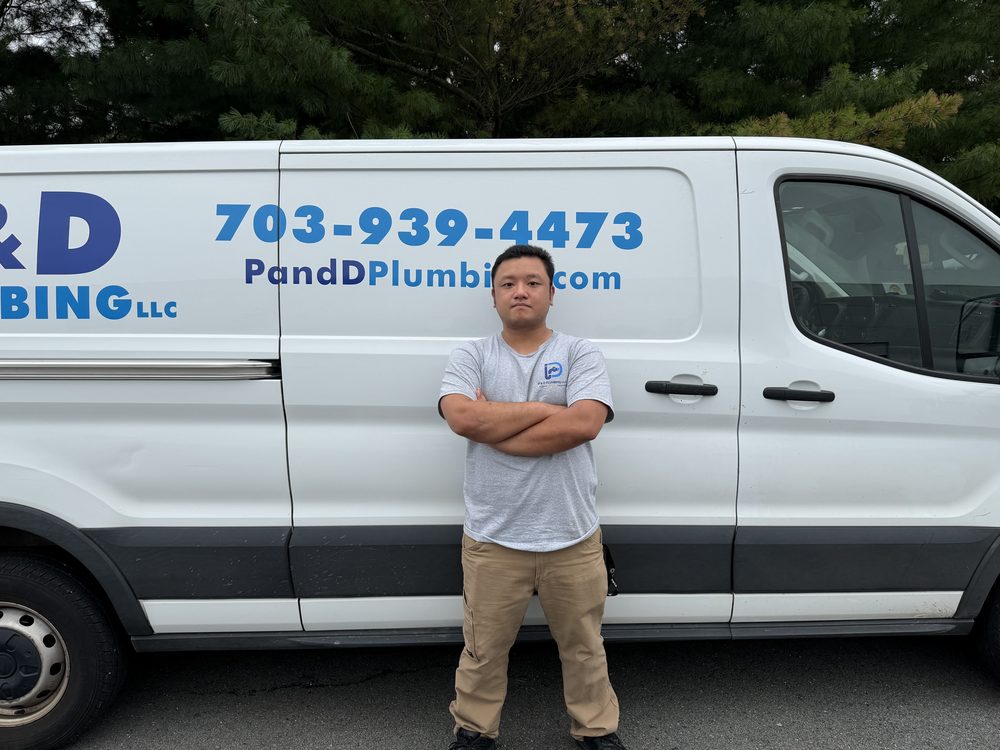 P & D Plumbing technician with our service van