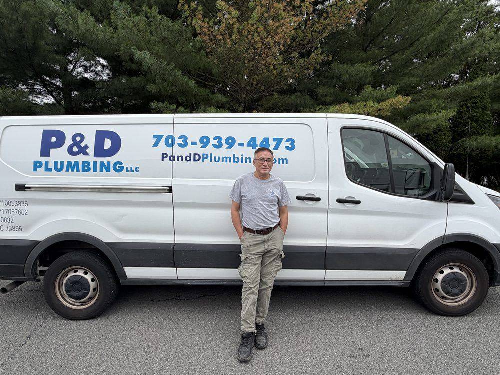 P & D Plumbing technician with our service van